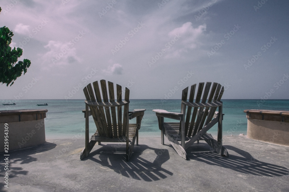 Pair of chairs on the beach Pair of chairs on the beach