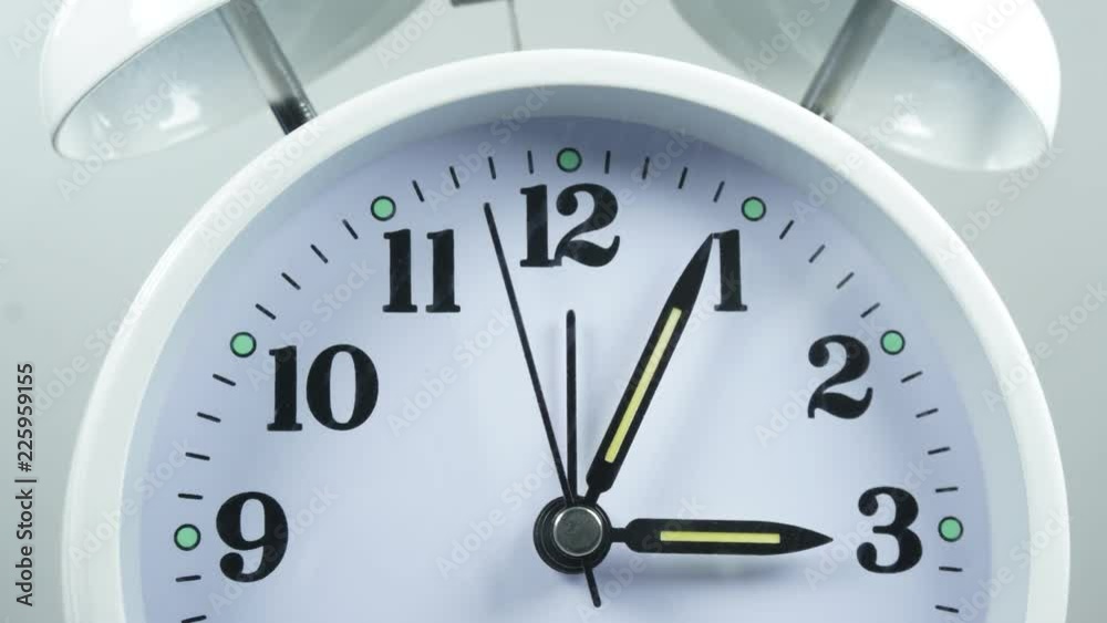 Close Up. White clock display showing time 15.00 am. Time-lapse 15 minutes. Close Up. White clock display showing time 15.00 am. Time-lapse 15 minutes.