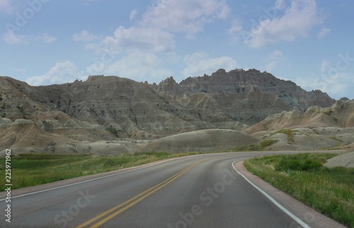 Paved roads wind around the impressive land and rock formations at Badlands National Park in South Dakota.