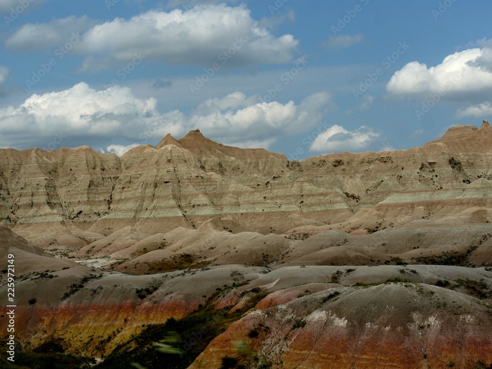Fototapeta premium Breathtaking beauty of colorful rock formations and landscape at Badlands National Park in South Dakota, USA.