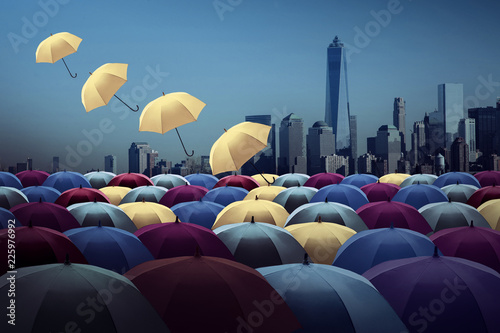 yellow umbrella fly out the city of colorful umbrella,Colorful umbrellas in the sky. The freedom that we can choose,vitage tone