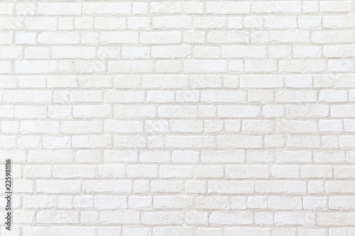 weathered white brick wall texture background.