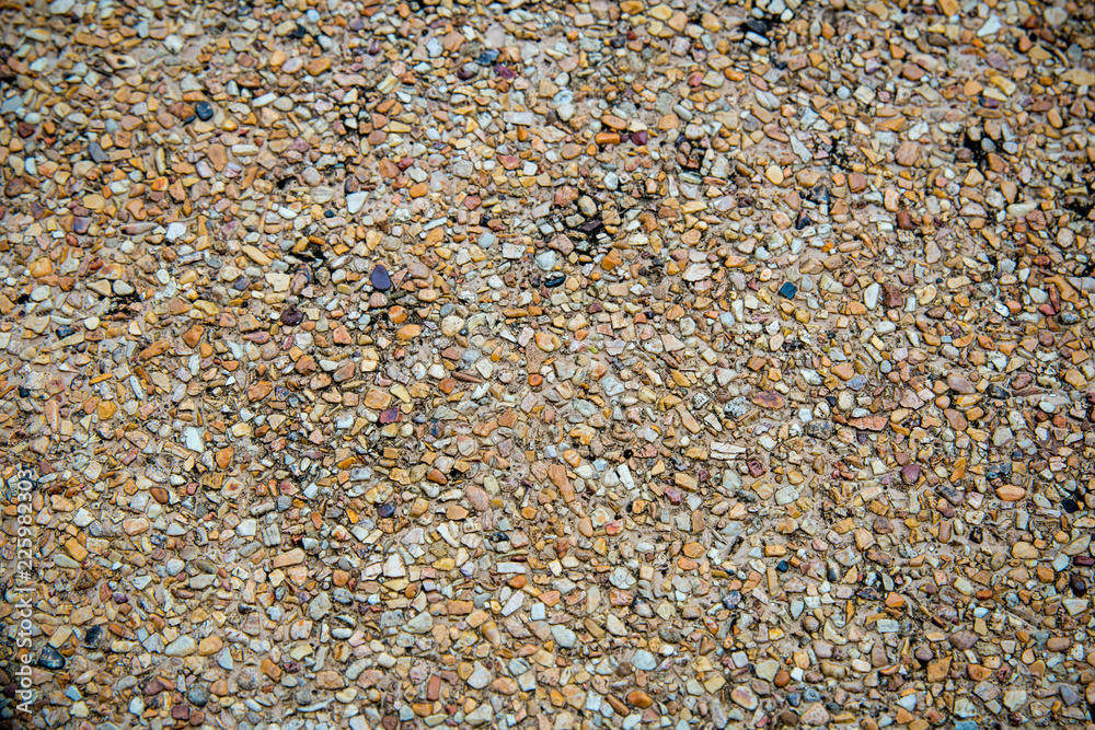 Texture washed sand background.Small sand stone of sand wall texture or sand wall background. flor background texture. wash gravel, wash stone Texture washed sand background.Small sand stone of sand wall texture or sand wall background. flor background texture. wash gravel, wash stone
