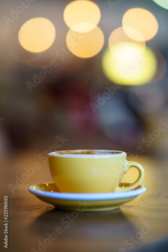 Coffee Milk and Foam with Bokeh Background