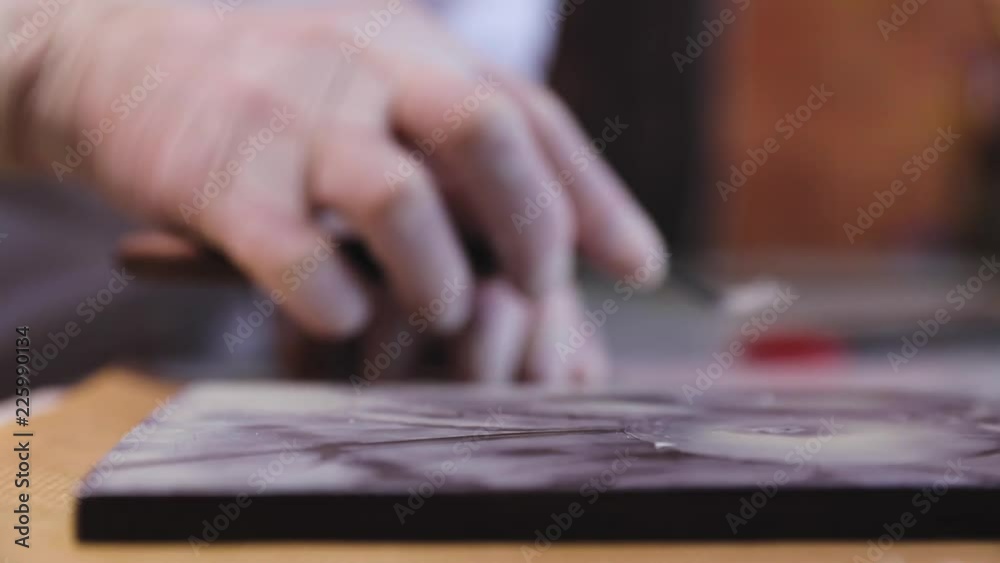 Chocolate Art. Closeup Of Cutting Picture On Handmade Chocolate Chocolate Art. Closeup Of Cutting Picture On Handmade Chocolate