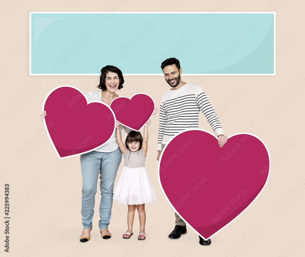 Happy family holding heart icons Happy family holding heart icons