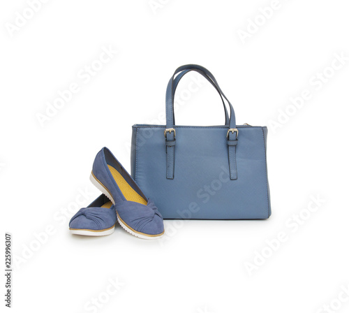 Woman shoes and bag isolated on the white background