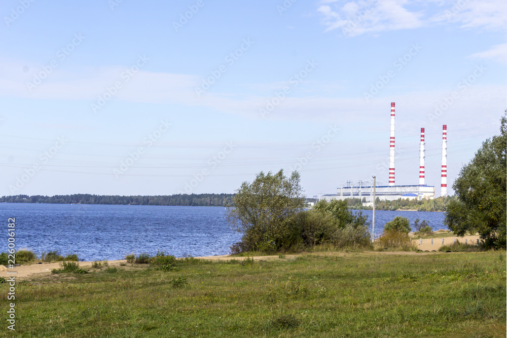 The Volga River. Central Russia.Power line and power station on the banks of the river.Background for the site about travel,electricity,power station.