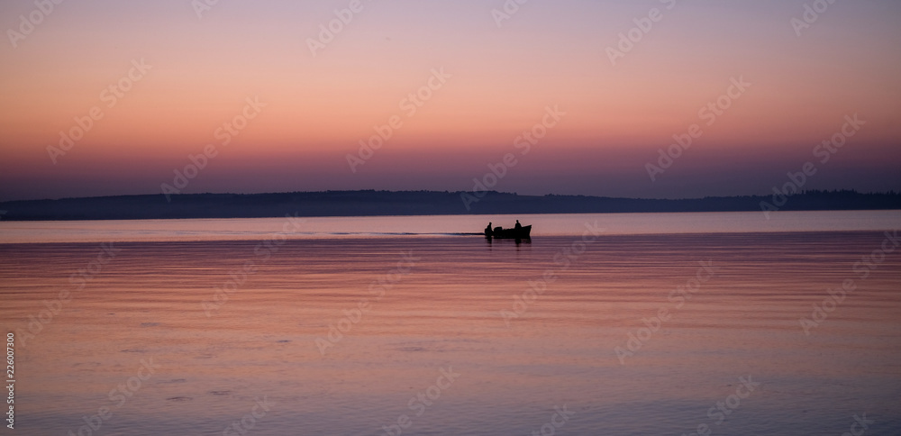 sunset , boat in the lake