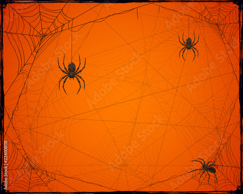 Orange Halloween background with spiders and cobwebs