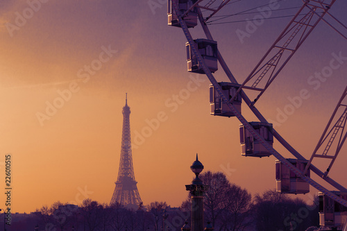 Paris, France, view on Concord square - observation wheel, Eiffel tower in the evening sunset sun rays. Selective focus