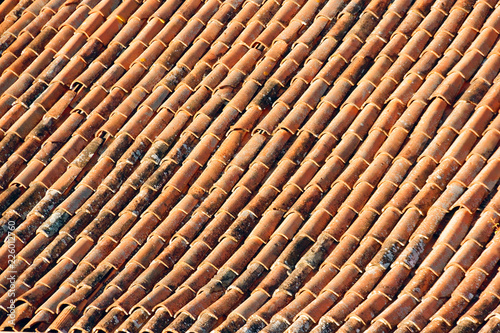 red tiles on the roof of the house.