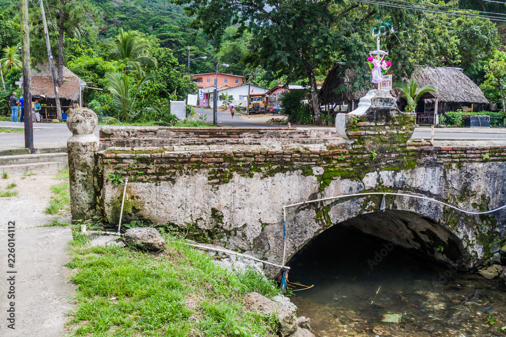 PORTOBELO, PANAMA - MAY 28, 2016: Old dilapidated bridge in Portobelo village, Panama PORTOBELO, PANAMA - MAY 28, 2016: Old dilapidated bridge in Portobelo village, Panama