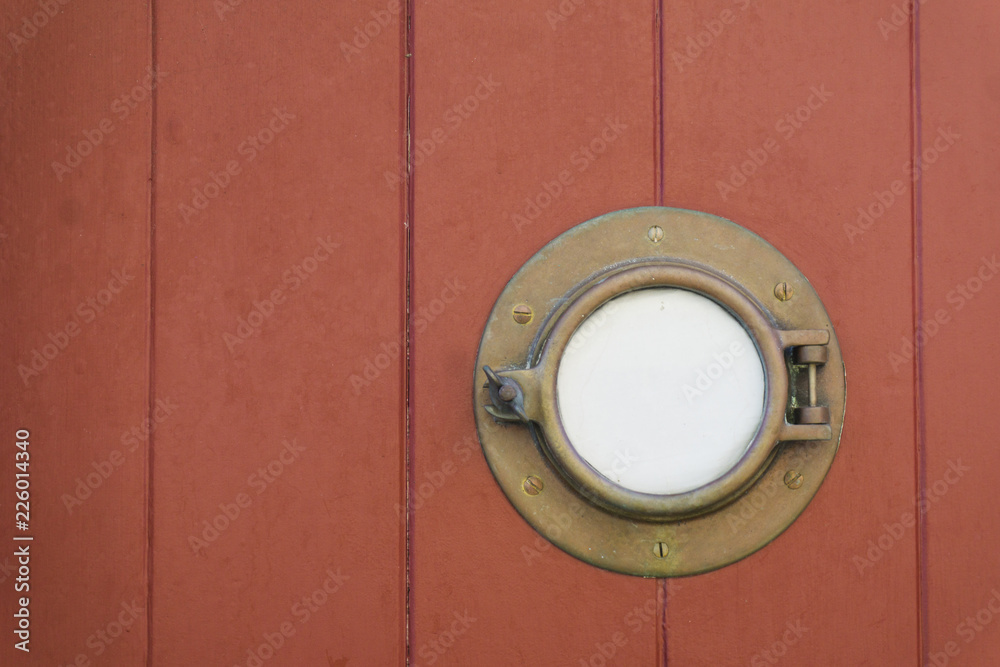 Wooden texture background with porthole Wooden texture background with porthole