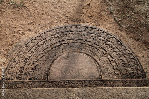 Moon stone at Buddha Seema Prasada (Baddhasima Prasada) in the ancient city Polonnaruwa, Sri Lanka photo