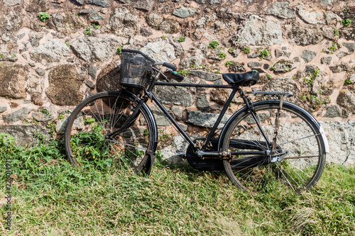 Bicycle and an old fortification wall in Galle, Sri Lanka