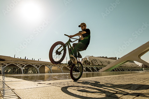 Guy riding a bmx bike. bmx freestyle