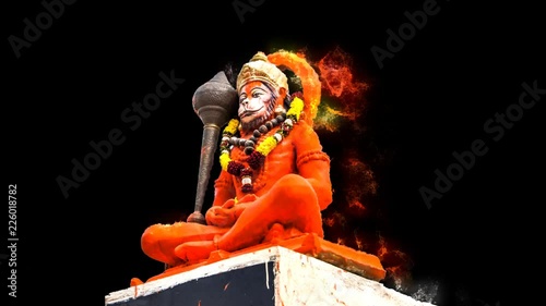 Hindu god Hanuman magically praying.  Hindu God Hanuman idol, Particles animation, 