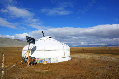 Landscape of yurt traditional nomadic homes for Western Mongolians on the steppe with beautiful blue sky background