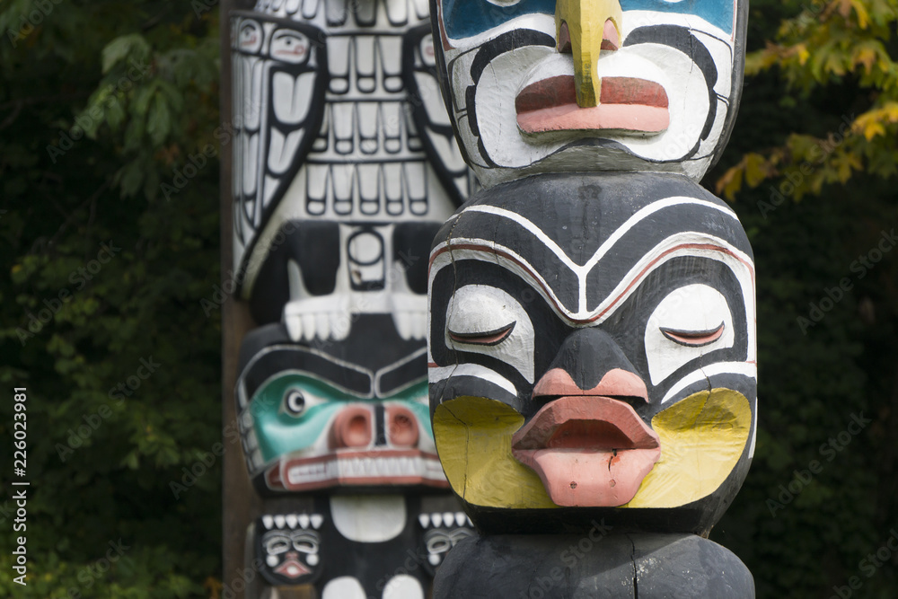 First Nations totem poles in Stanley Park, Vancouver, Canada First Nations totem poles in Stanley Park, Vancouver, Canada