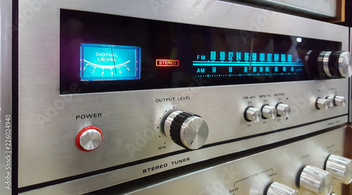 vintage analogue fm radio tuner with vumeter photo