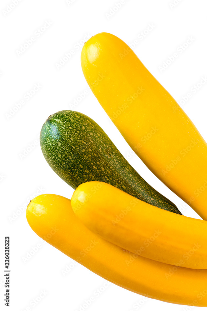 yellow and green cukini on white
 - obrazy, fototapety, plakaty 