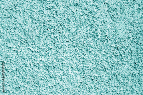 Concrete wall background in cyan color.