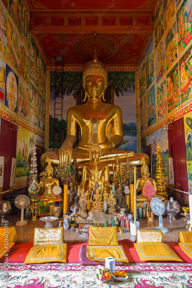 Altar and many golden Buddha statues inside of decorative Wat Mixai (Mixay) (