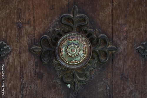 sacred ornament on the door of a church in Palma de Mallorca