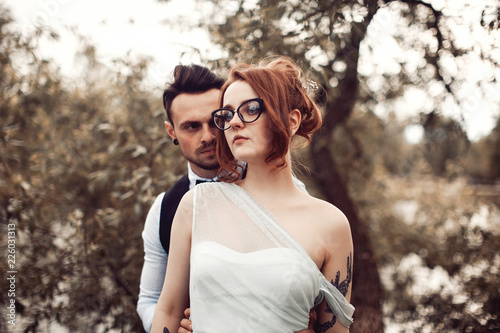 tattoed couple wedding