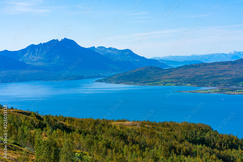 Aerial view of the mountains and hills around Tromso and Tromsoysundet strait in Norway