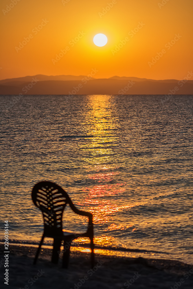 Fototapeta premium Early morning , dramatic sunrise over sea and mountain. Photographed in Asprovalta, Greece.