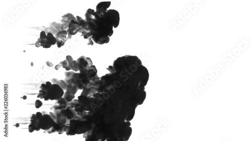 black Ink trickle dissolves in water in slow motion isolated on white background. included luma matte for use as transitions or the spectacular presentation of something. 3d v12 photo