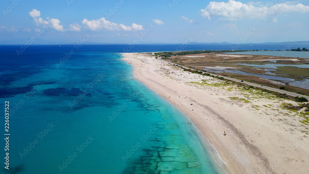 Aerial bird's eye view photo taken by drone of tropical white sandy beach with turquoise clear waters