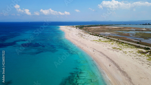 Aerial bird s eye view photo taken by drone of tropical white sandy beach with turquoise clear waters