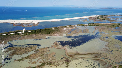 Aerial drone view of Lefkada Canal a natural entrance to the island with swamp like landscape near castle of Agia Mavra, Ionian, Greece photo