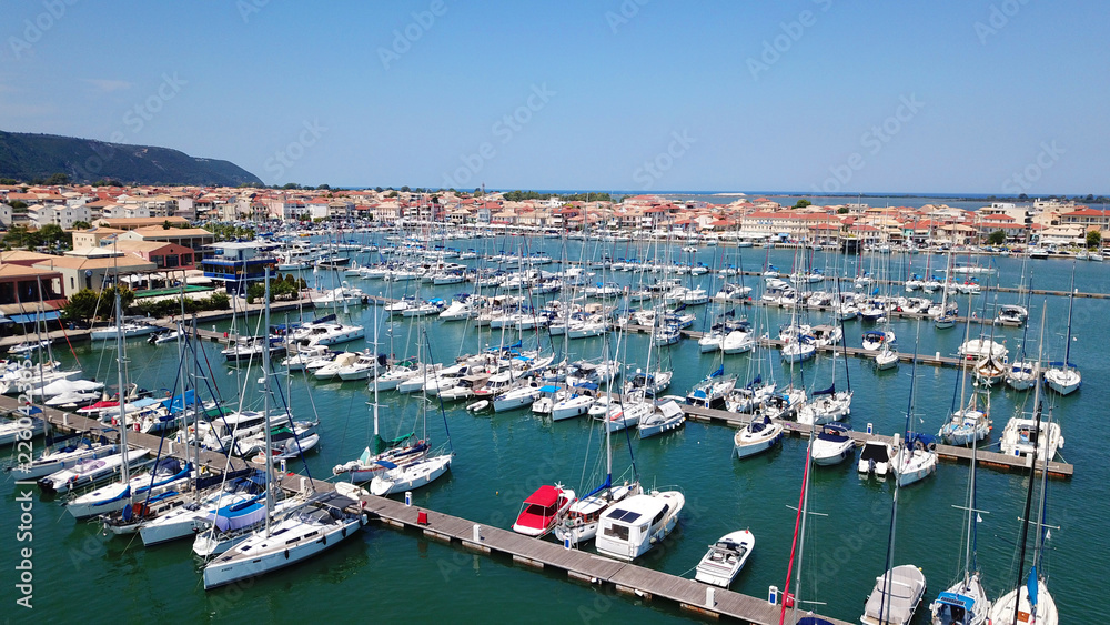 Aerial drone photo of sail boats docked in mediterranean destination port