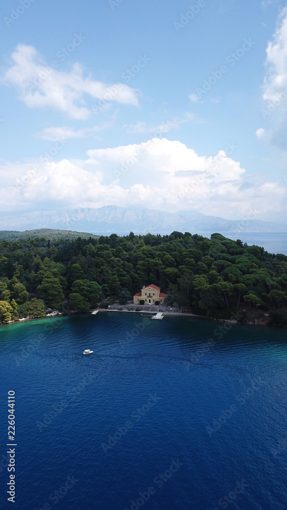 Fototapeta premium Aerial drone photo of iconic uninhabited island of Madouri in bay of Nydri and Mansion of 19th-century poet Aristotelis Valaoritis, Lefkada, Ionian, Greece