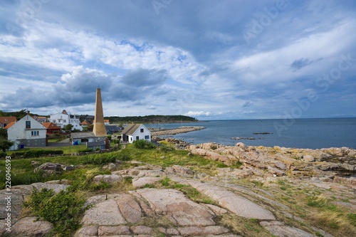 View of small town on beautiful stony coast of Bornholm island - Sandvig, Denmark