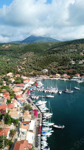 Aerial drone photo of famous seaside village and bay of Sivota Lefkadas famous for trips to nearby beaches and dafe harbouring to sail boats, Lefkada, Greece photo