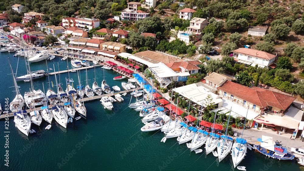 Aerial drone photo of famous seaside village and bay of Sivota Lefkadas famous for trips to nearby beaches and dafe harbouring to sail boats, Lefkada, Greece
