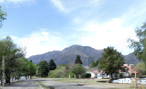 Village landscape with mountains in the background