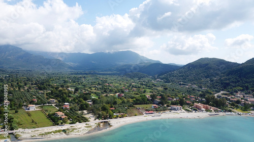 Aerial drone photo of famous seaside village and port of Vasiliki famous for trips to Ionian islands and nearby beaches, Lefkada, Greece © aerial-drone