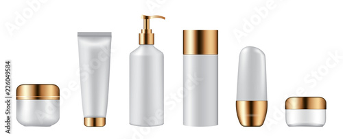Set of cosmetic bottles on white background