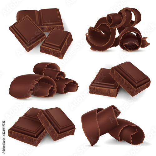 Set of broken chocolate bars and shavings