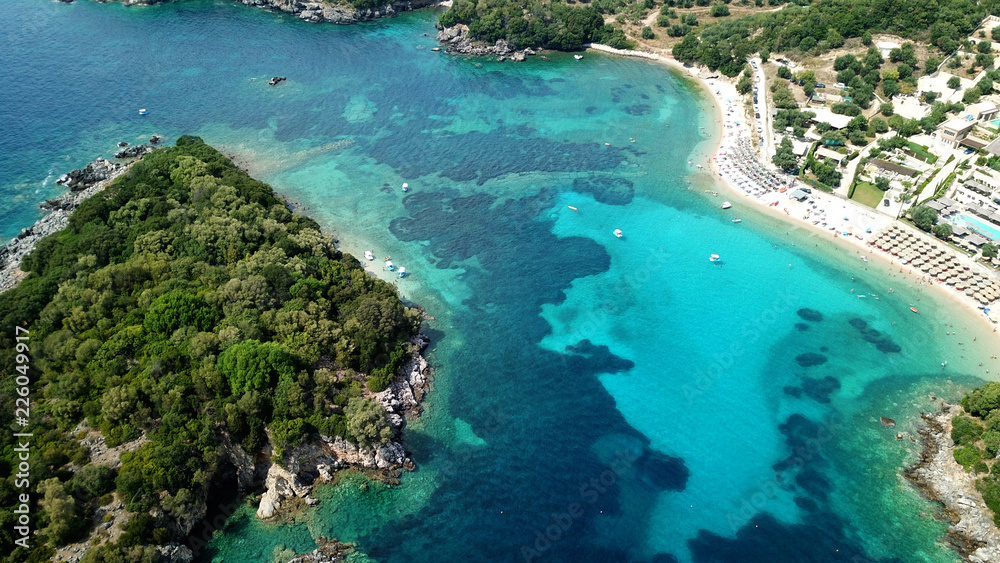  Aerial drone bird's eye view photo of famous sandy beach and small island of Agia Paraskevi with emerald clear sea, Thesprotia, Epirus, Greece