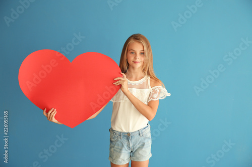 Cute little girl with paper...