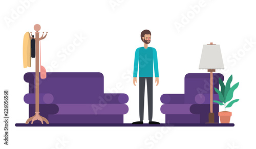 young man with beard on the livingroom