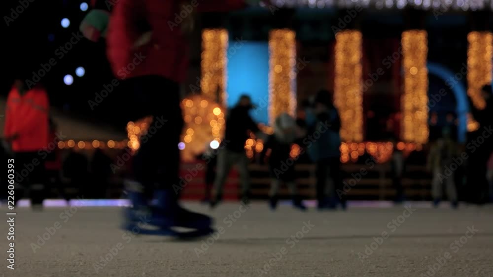 People are enjoying skating. Unfocused skating people.