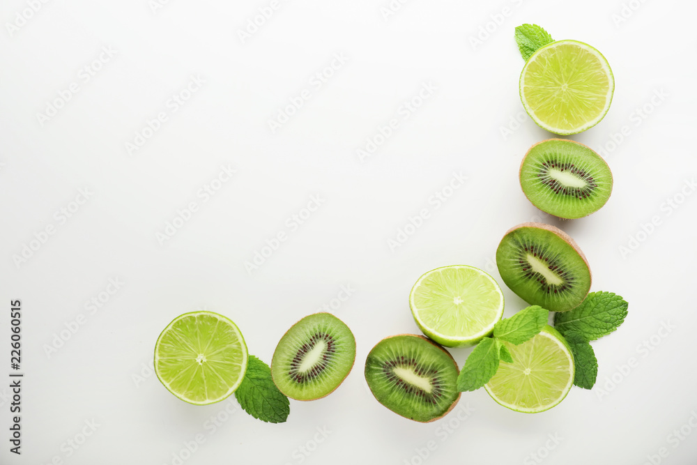Summer composition with tropical fruits on white background